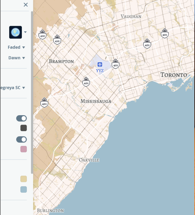 The photograph shows a screenshot of one of the altered map styles (Dawn, Faded) on the Mapbox website.