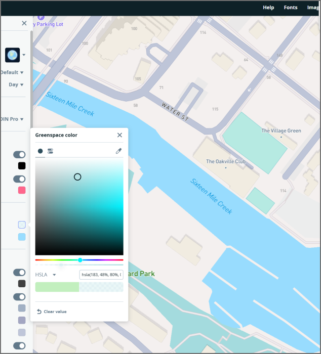 The photo shows a screenshot from the Mapbox website testing changes to the colors of rivers and grass on the map.